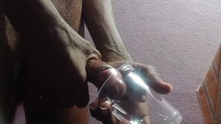 Rajesh masturbating, spitting on cock & cumming in glass 2 - 11 image