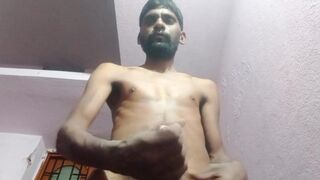 Rajesh masturbating, spitting on cock & cumming in glass 2 - 3 image
