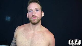 RawFuckBoys Tattooed muscle jock sucked by blindfolded bottom - 1 image