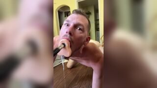 Faggot gags and spits on deep throat fuck machine dildo