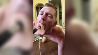 Faggot gags and spits on deep throat fuck machine dildo - 13 image