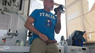 Old Mature Hung Big Cock Repairman Is Fixing the Washmachine for a Horny Couple - 1 image