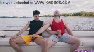 Watch these two hot studs get wild with each other on a boat in the open ocean!